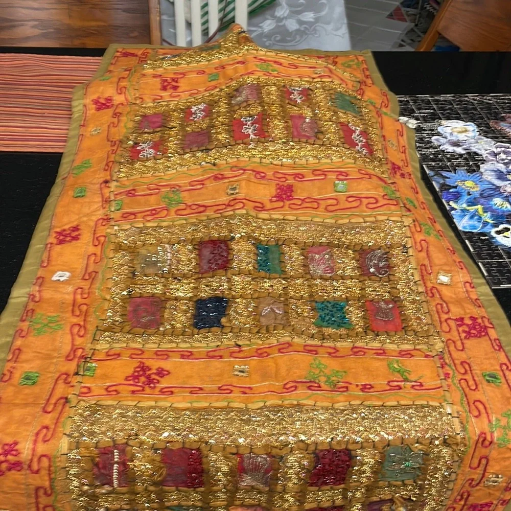 Table runner. 58 in length. Width 22 inches